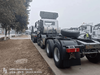 Trator Sinotruk Howo NX 8x4 (prata)